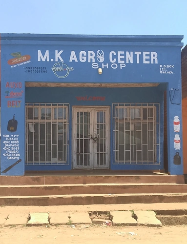 M.k Agri Center shop Logo